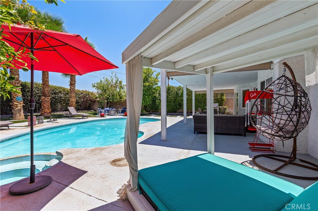 68190 Galardo Road Cathedral City, CA 92234 - Photo 22 of 24 a view of a backyard with furniture and a porch
