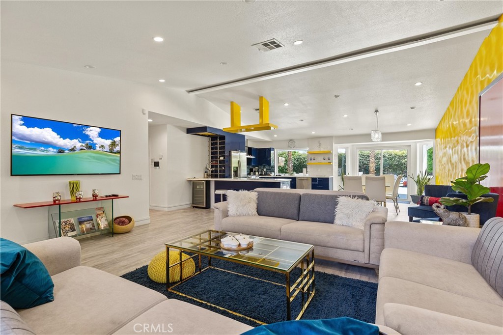 68190 Galardo Road Cathedral City, CA 92234 - Photo 3 of 24 a living room with furniture kitchen view and a large window