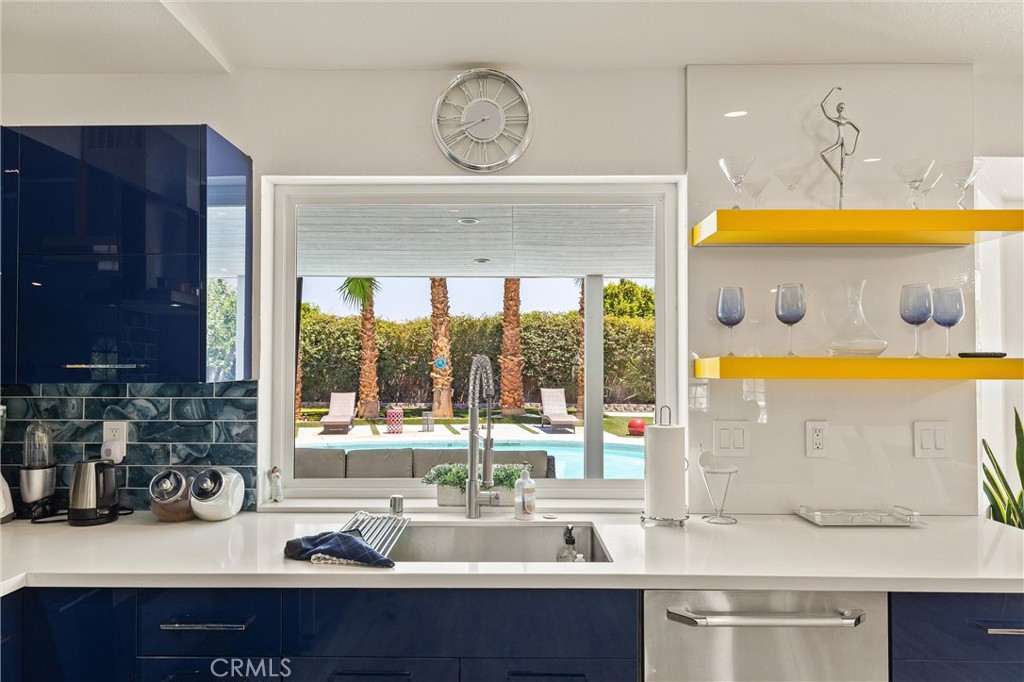 68190 Galardo Road Cathedral City, CA 92234 - Photo 9 of 24 a room with a sink and a large mirror