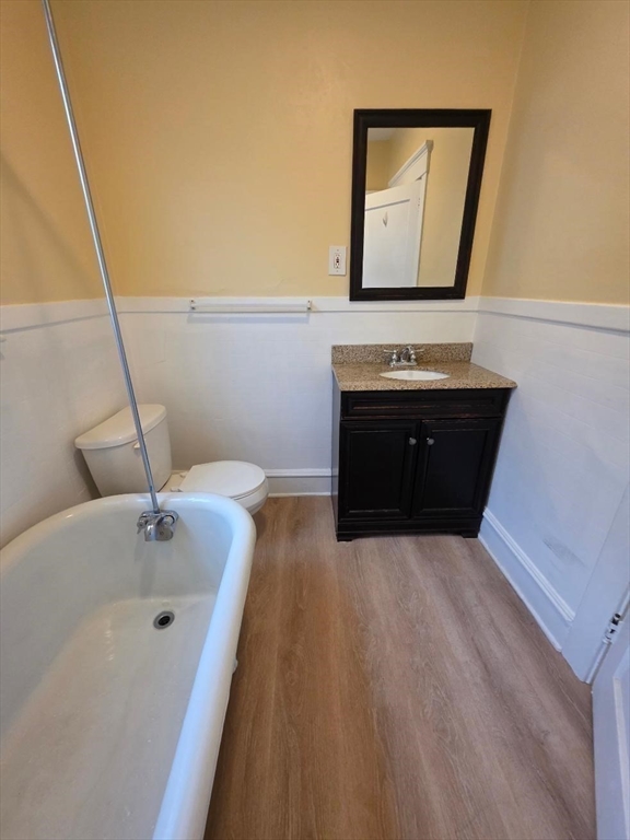 362 Pearce Street, Unit 2 Fall River, MA 02720 - Photo 14 of 24 a bathroom with a bathtub sink and mirror