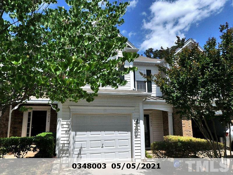 7034 Racine Way Raleigh, NC 27615 - Photo 1 of 1 a view of a house with a tree
