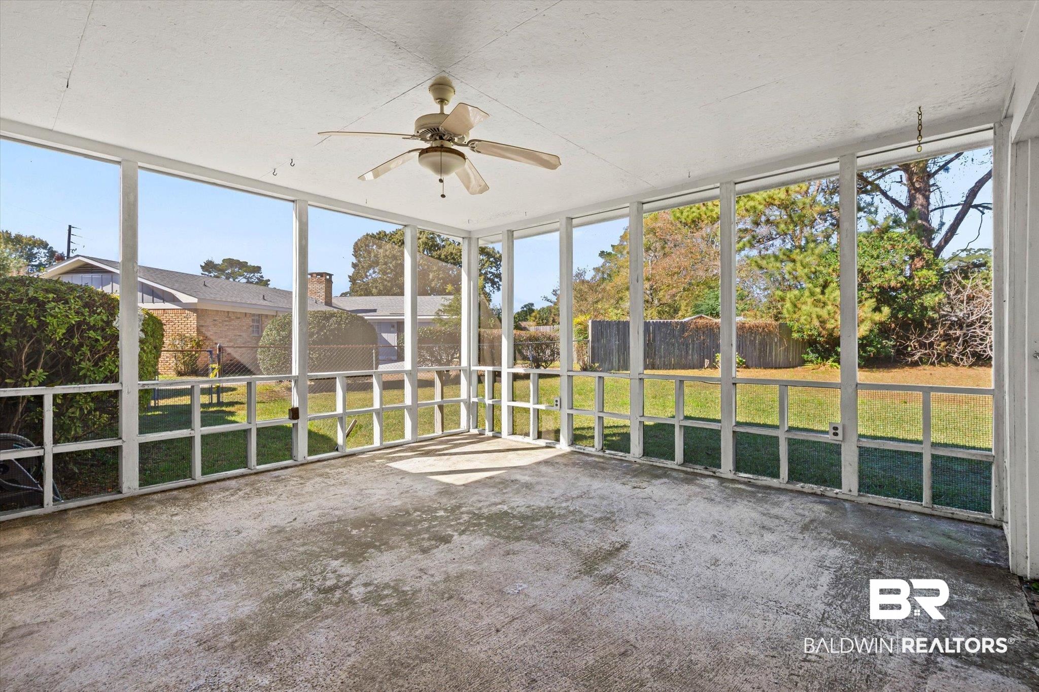6300 Christopher Drive North Mobile, AL 36609 - Photo 17 of 22 Unfurnished sunroom with ceiling fan
