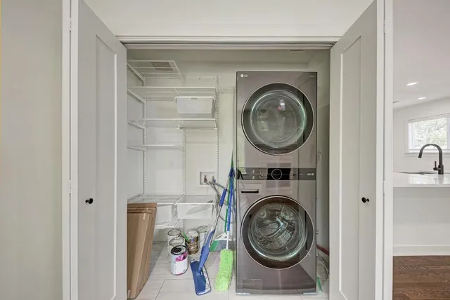 a utility room with dryer and washer