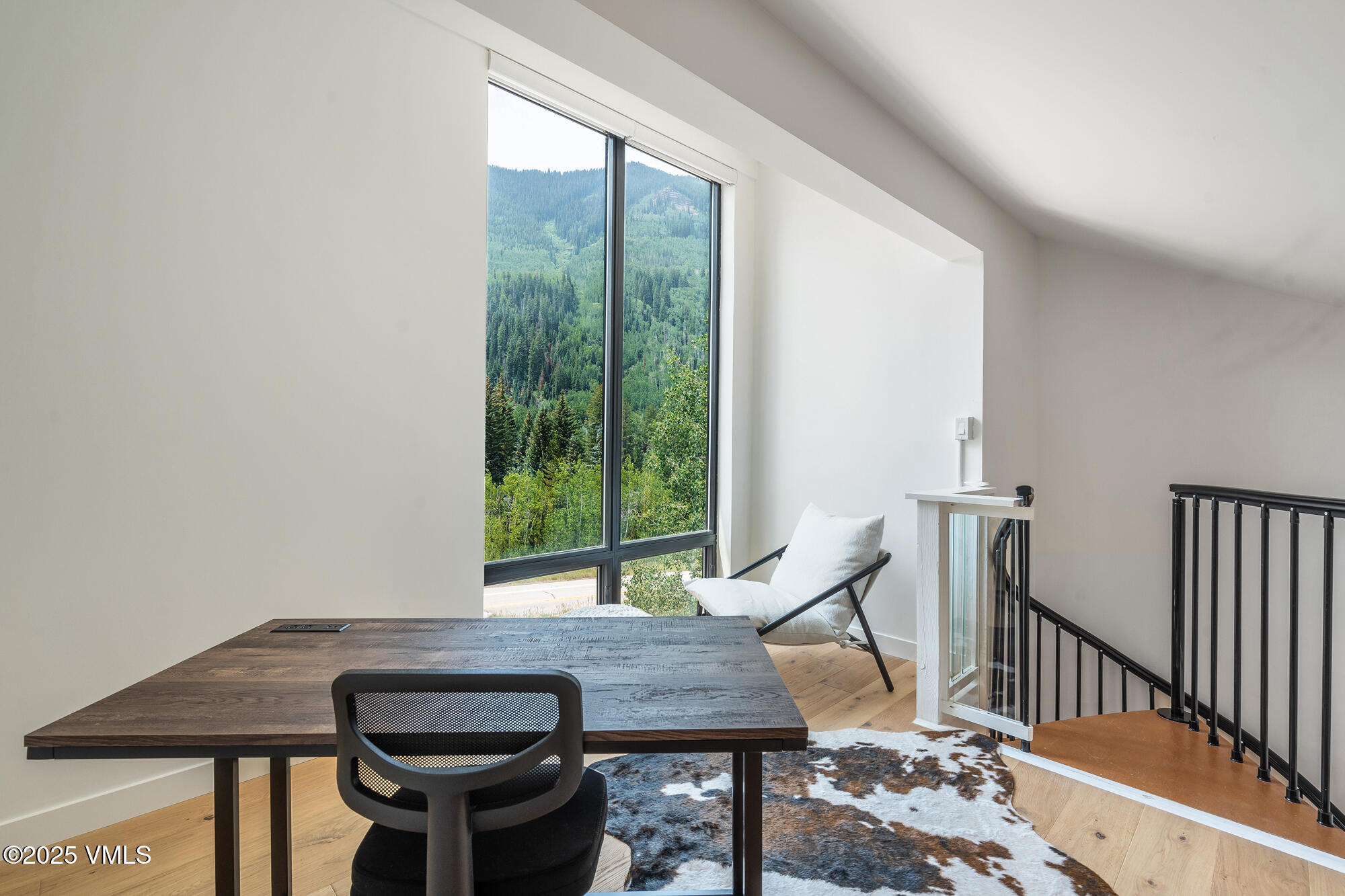 4545 Big Horn Road Vail, CO 81657 - Photo 26 of 49 a view of a workspace with furniture and window