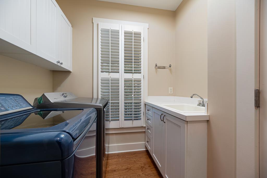 142 Maple Trace Pine Mountain, GA 31822 - Photo 28 of 61 a utility room with dryer and washer