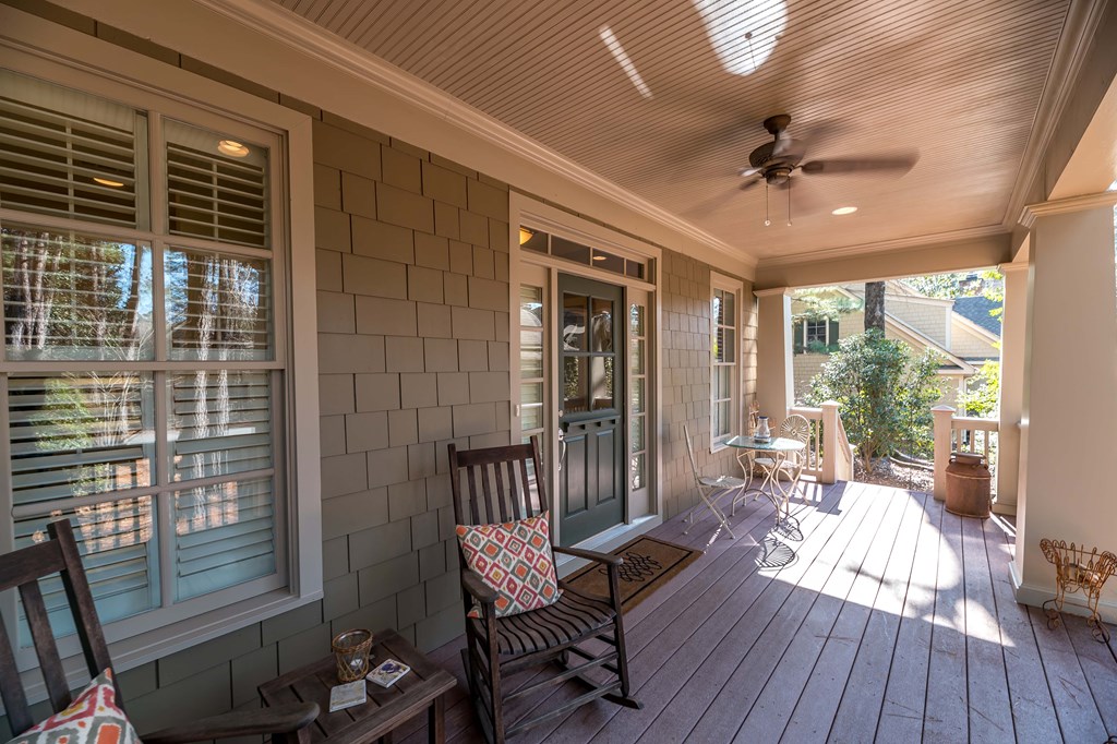 142 Maple Trace Pine Mountain, GA 31822 - Photo 4 of 61 a living room with furniture and a floor to ceiling window