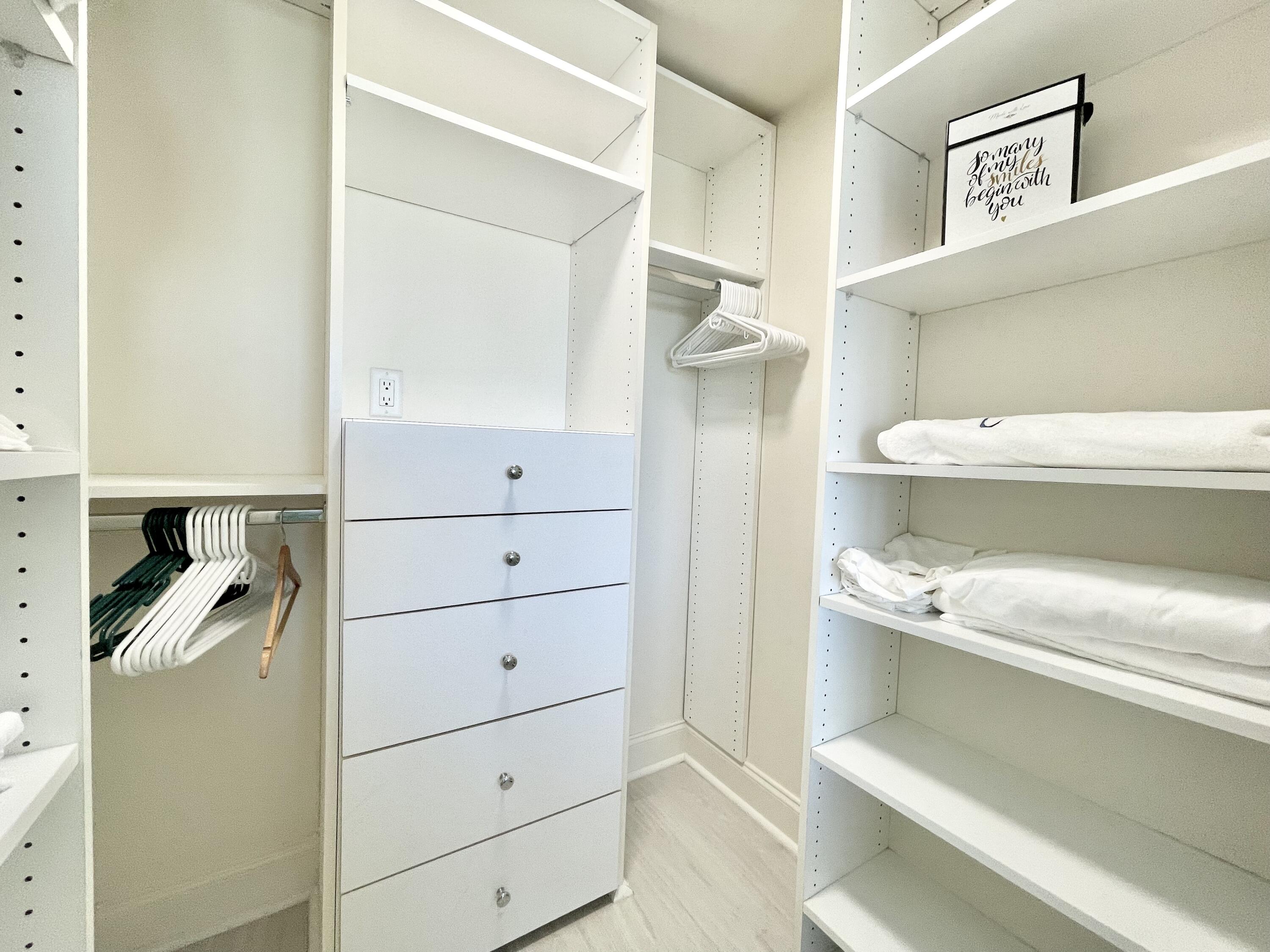 99 Southeast Mizner Boulevard, Unit PH5 Boca Raton, FL 33432 - Photo 20 of 48 a view of closet and bathroom