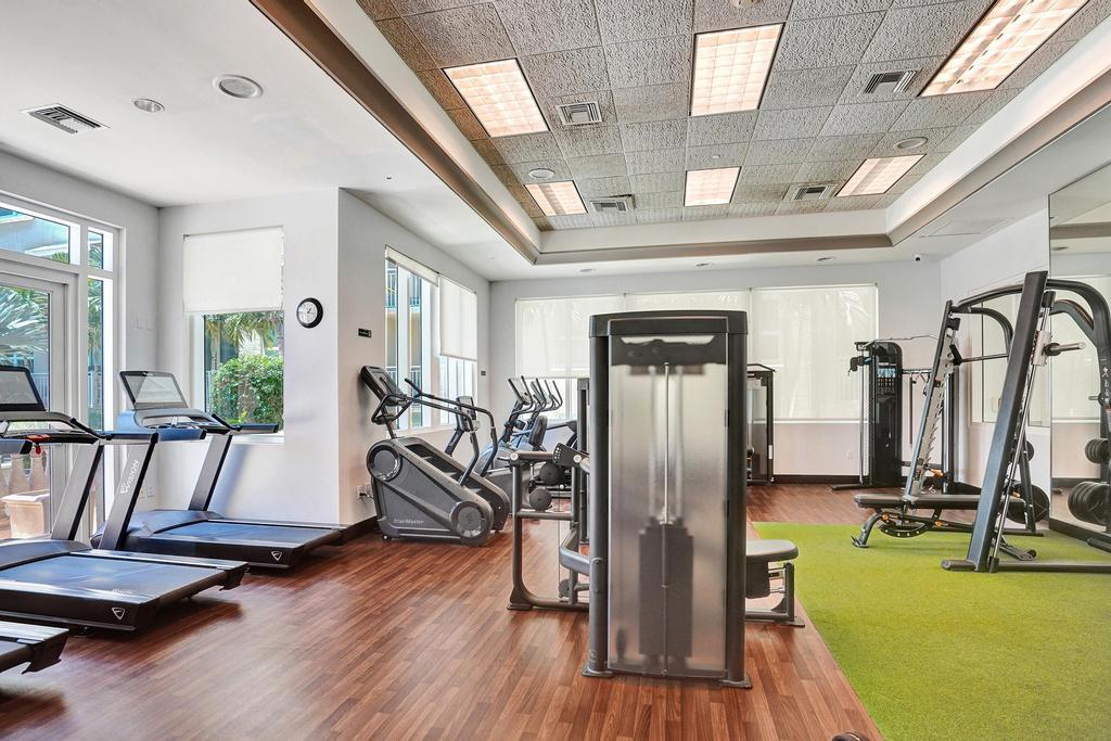 99 Southeast Mizner Boulevard, Unit PH5 Boca Raton, FL 33432 - Photo 38 of 48 a view of a room with gym equipment