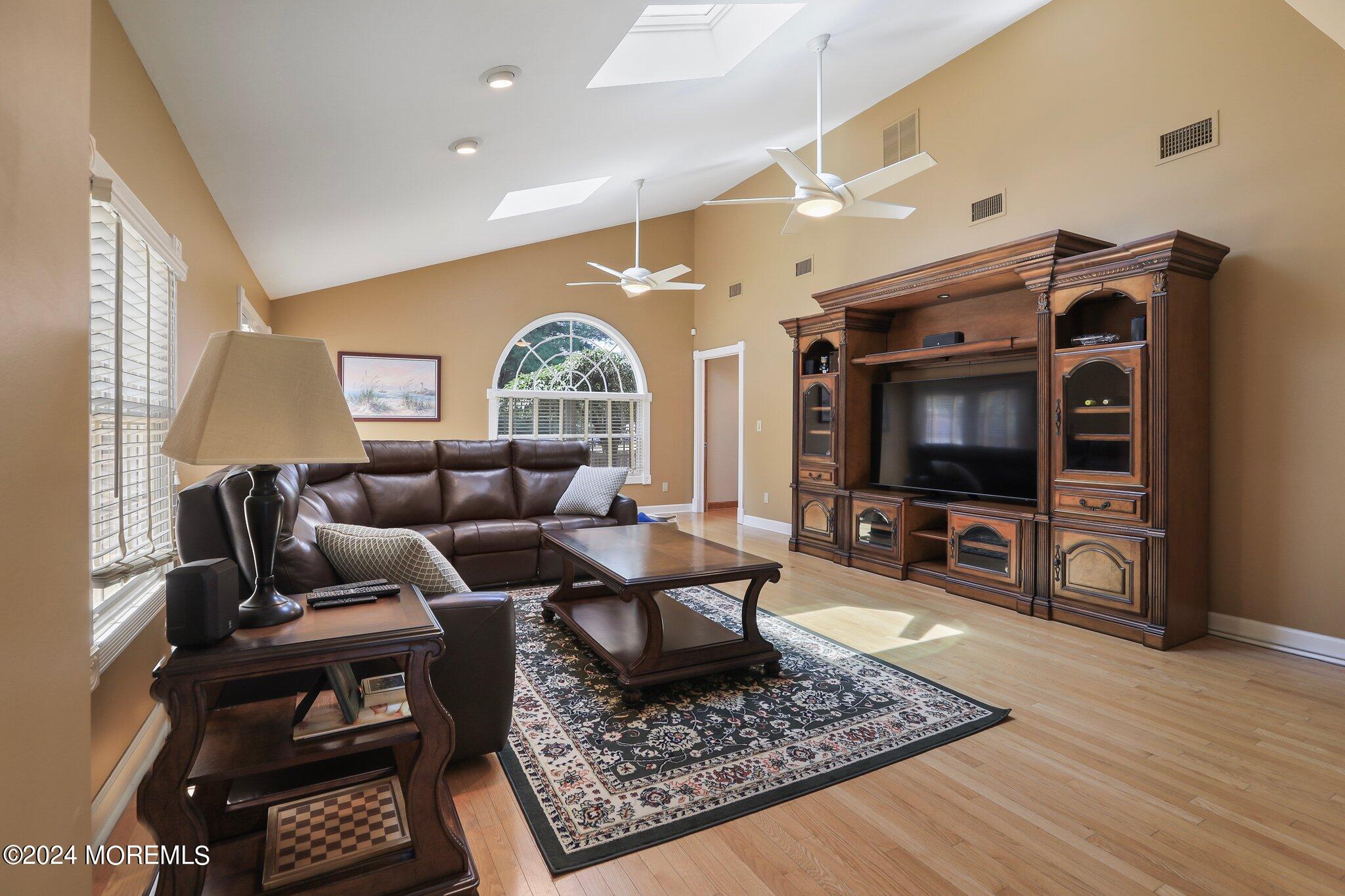 2 Cedar Court Marlboro, NJ 07746 - Photo 11 of 46 a living room with furniture and a flat screen tv