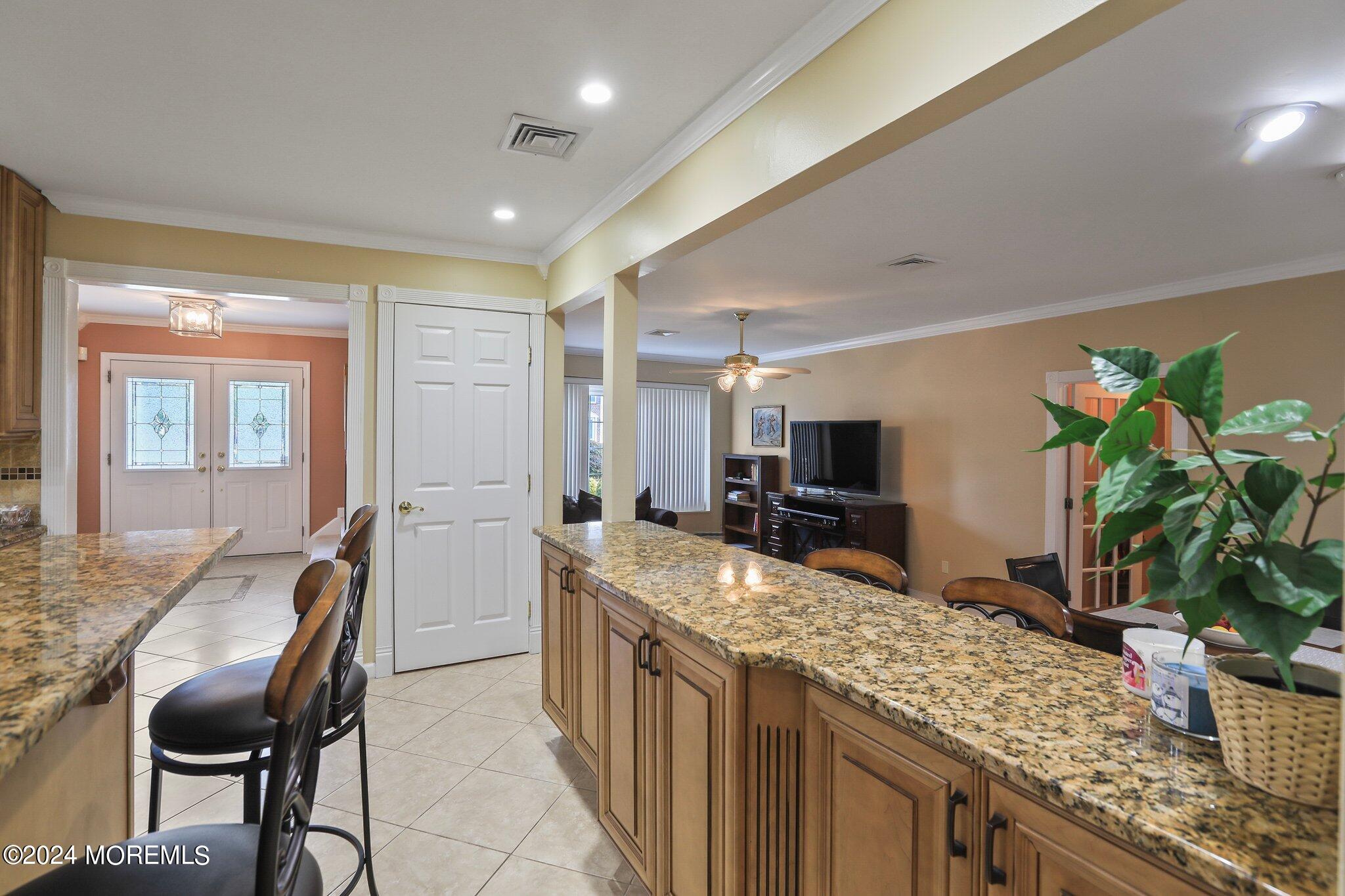 2 Cedar Court Marlboro, NJ 07746 - Photo 18 of 46 a kitchen with granite countertop lots of counter top space and stainless steel appliances