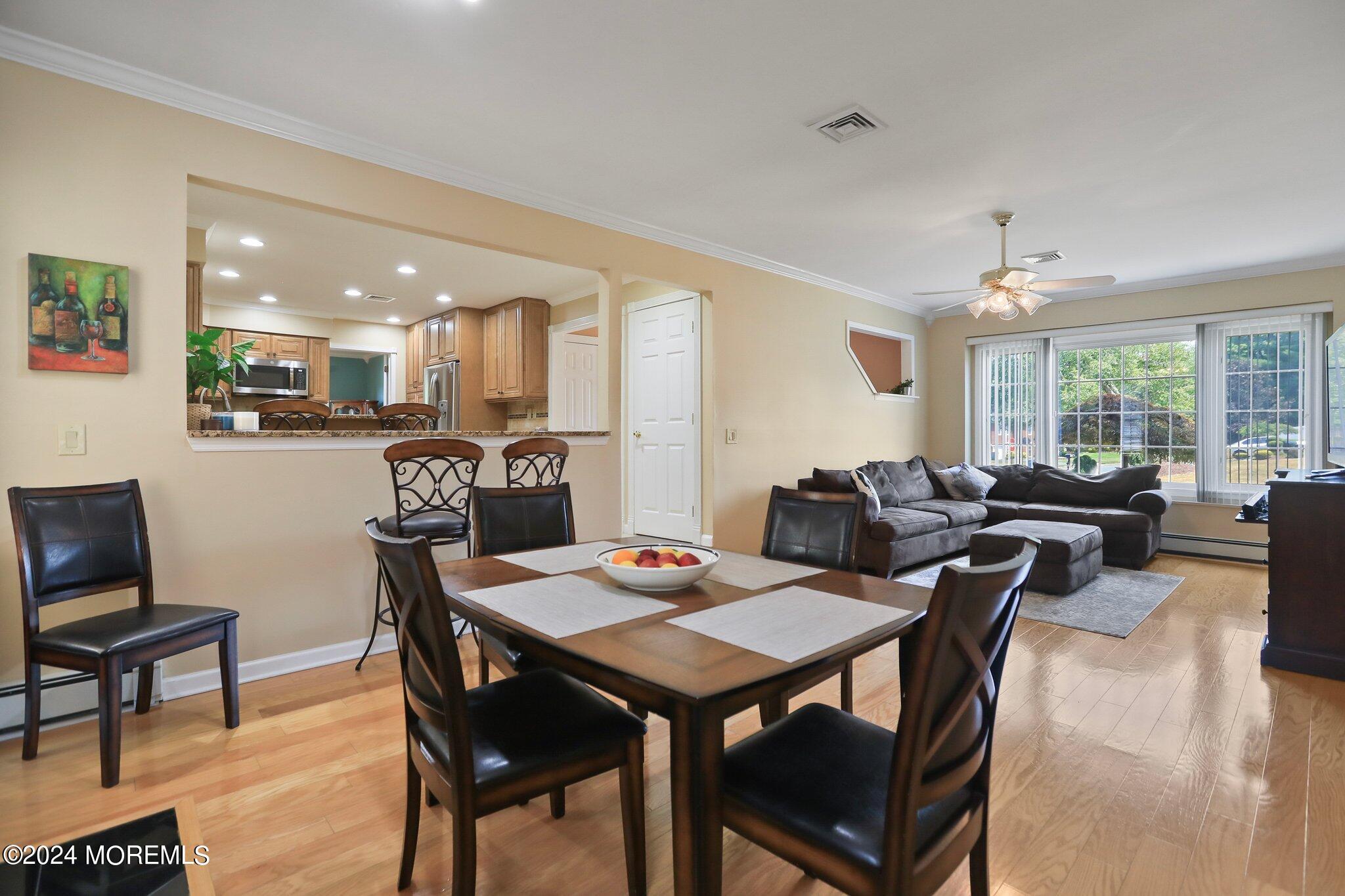 2 Cedar Court Marlboro, NJ 07746 - Photo 24 of 46 a view of a dining room with furniture