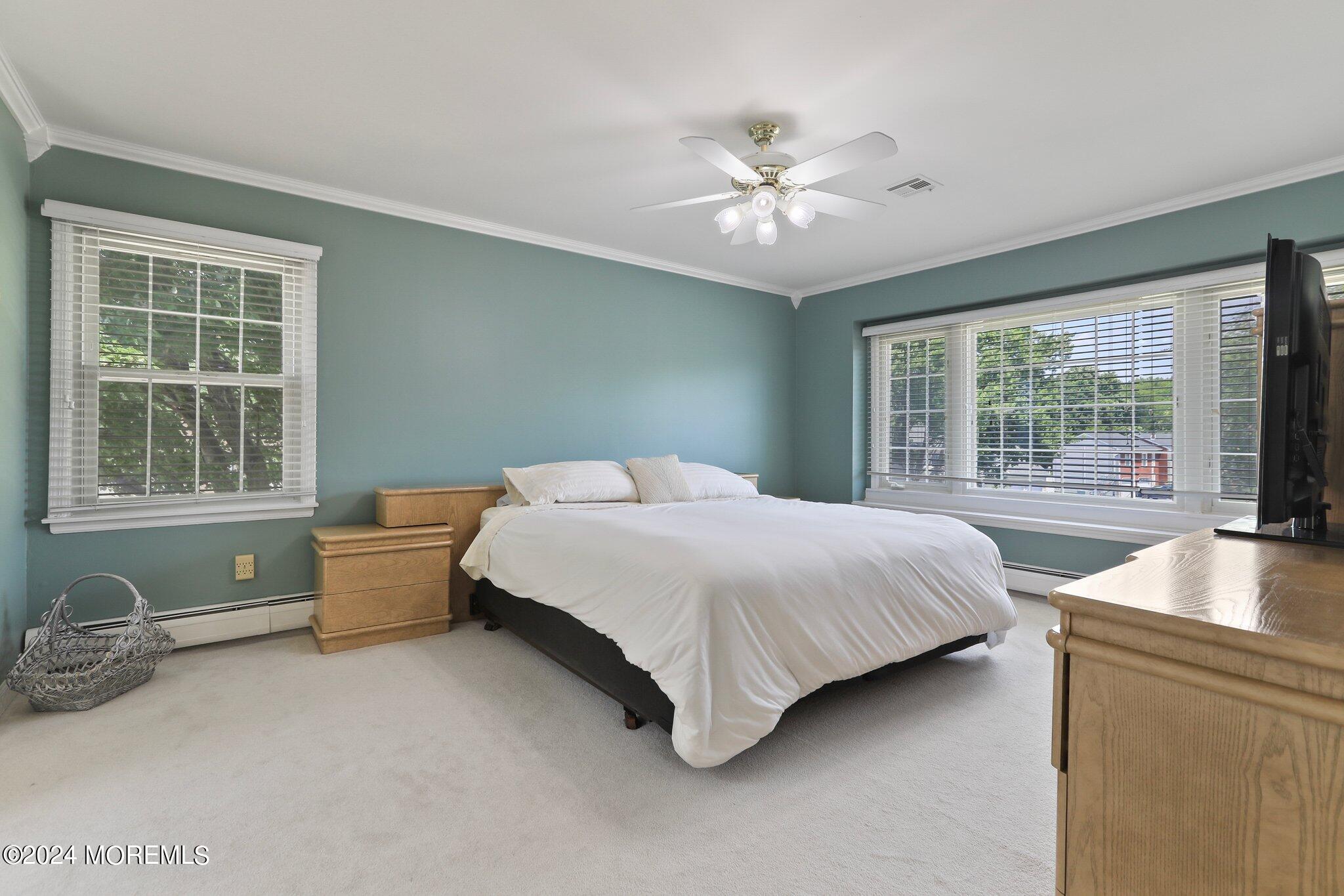 2 Cedar Court Marlboro, NJ 07746 - Photo 27 of 46 a bedroom with a large bed and windows