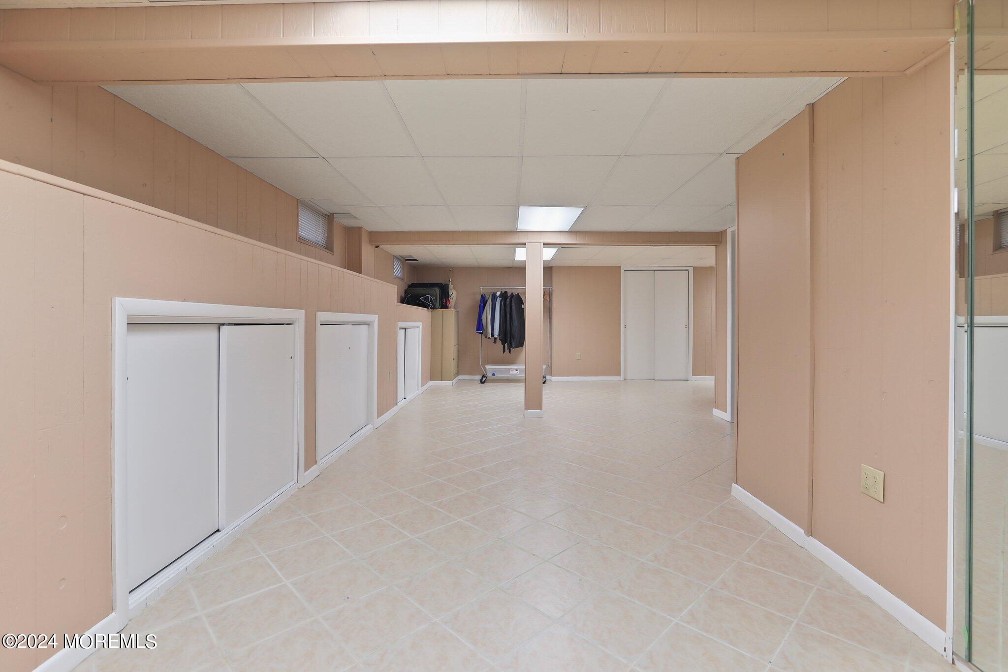 2 Cedar Court Marlboro, NJ 07746 - Photo 36 of 46 a view of a livingroom with a staircase