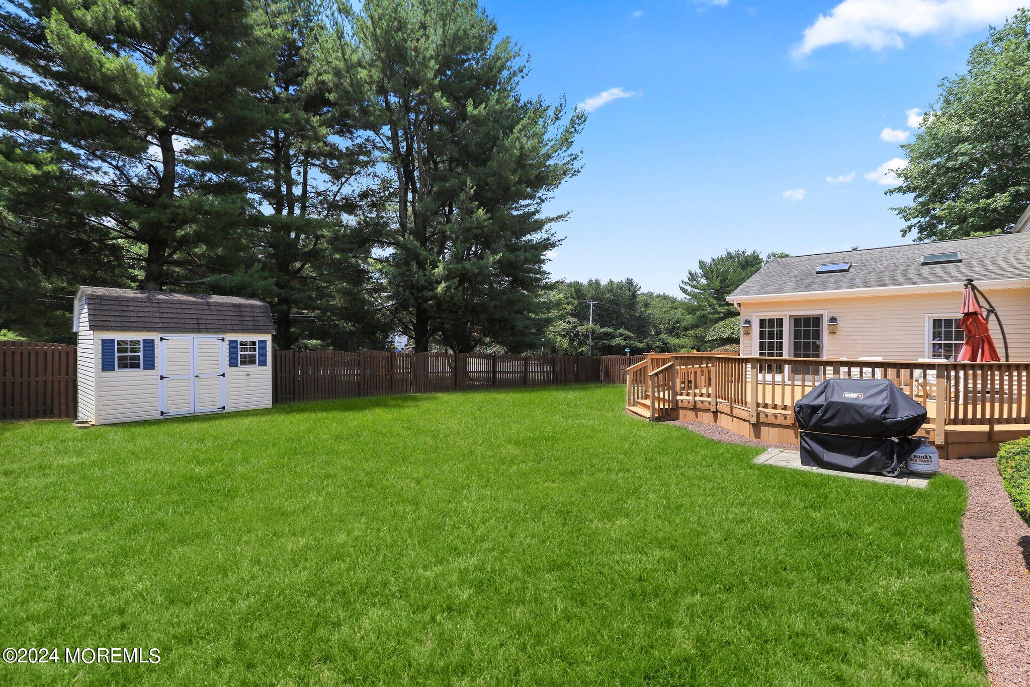 2 Cedar Court Marlboro, NJ 07746 - Photo 38 of 46 a view of a house with backyard and porch