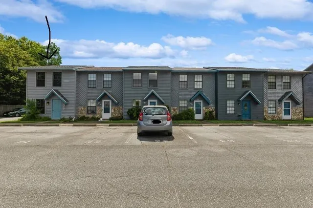 a car parked in front of a house
