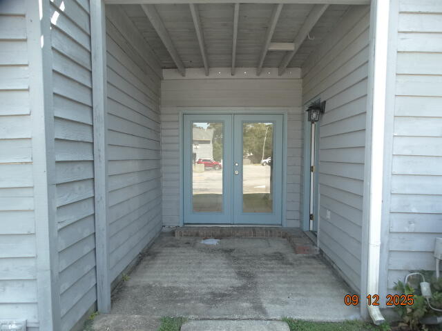 1325 Greendale Avenue, Unit 20 Fort Walton Beach, FL 32547 - Photo 29 of 30 a view of entryway with a yard