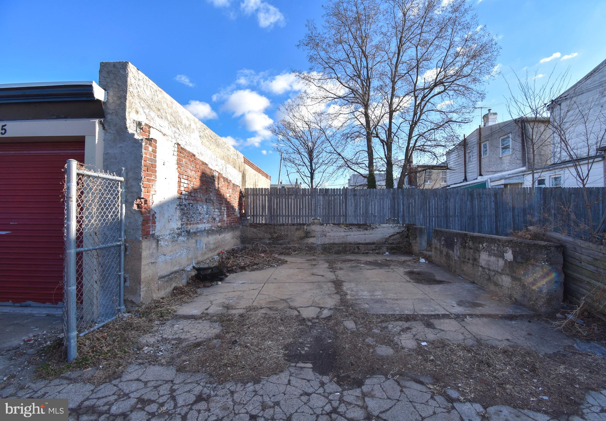 1963 Wakeling Street Philadelphia, PA 19124 - Photo 18 of 18 a backyard of a house