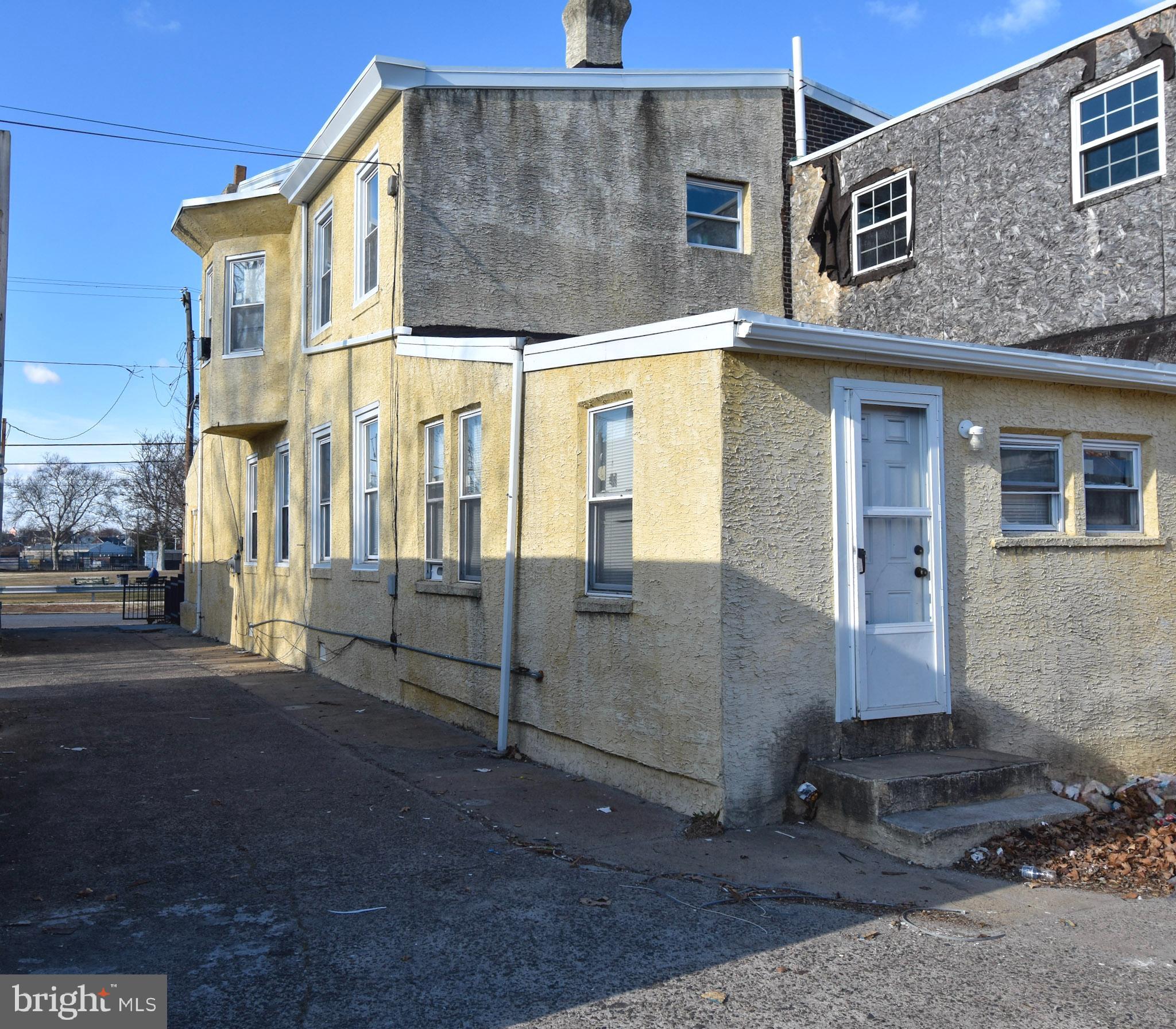 1963 Wakeling Street Philadelphia, PA 19124 - Photo 7 of 18 a view of a white building among the street