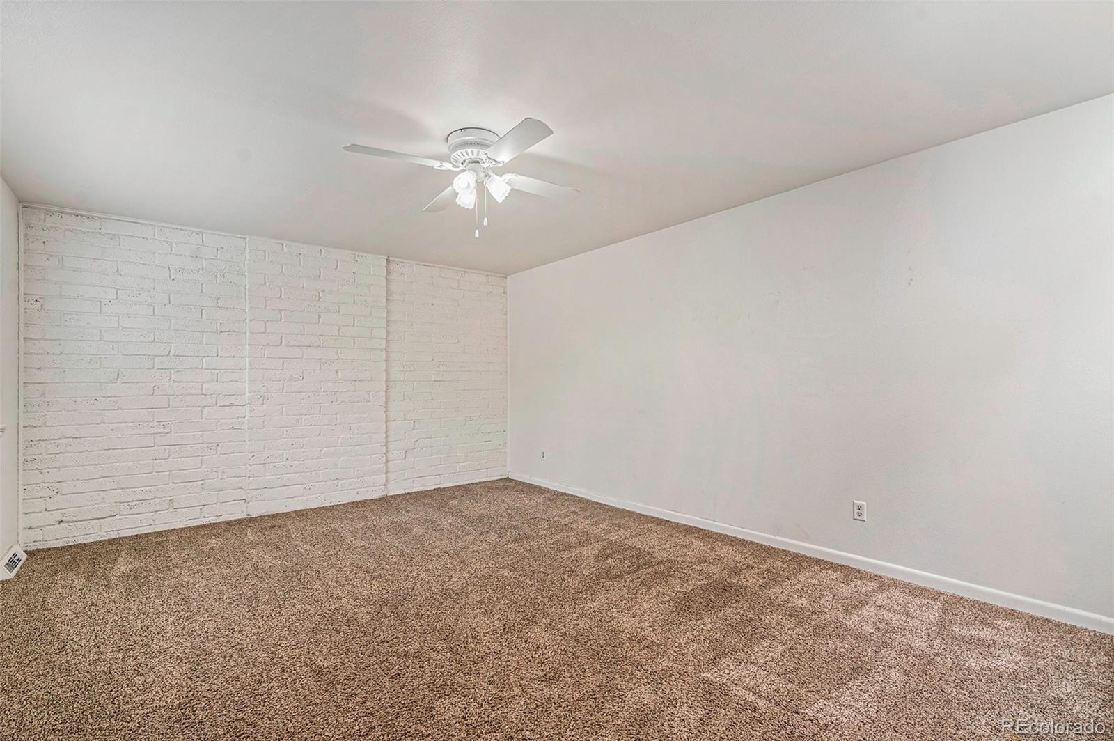 1233 South Yosemite Way, Unit 76 Denver, CO 80247 - Photo 12 of 20 a view of an empty room
