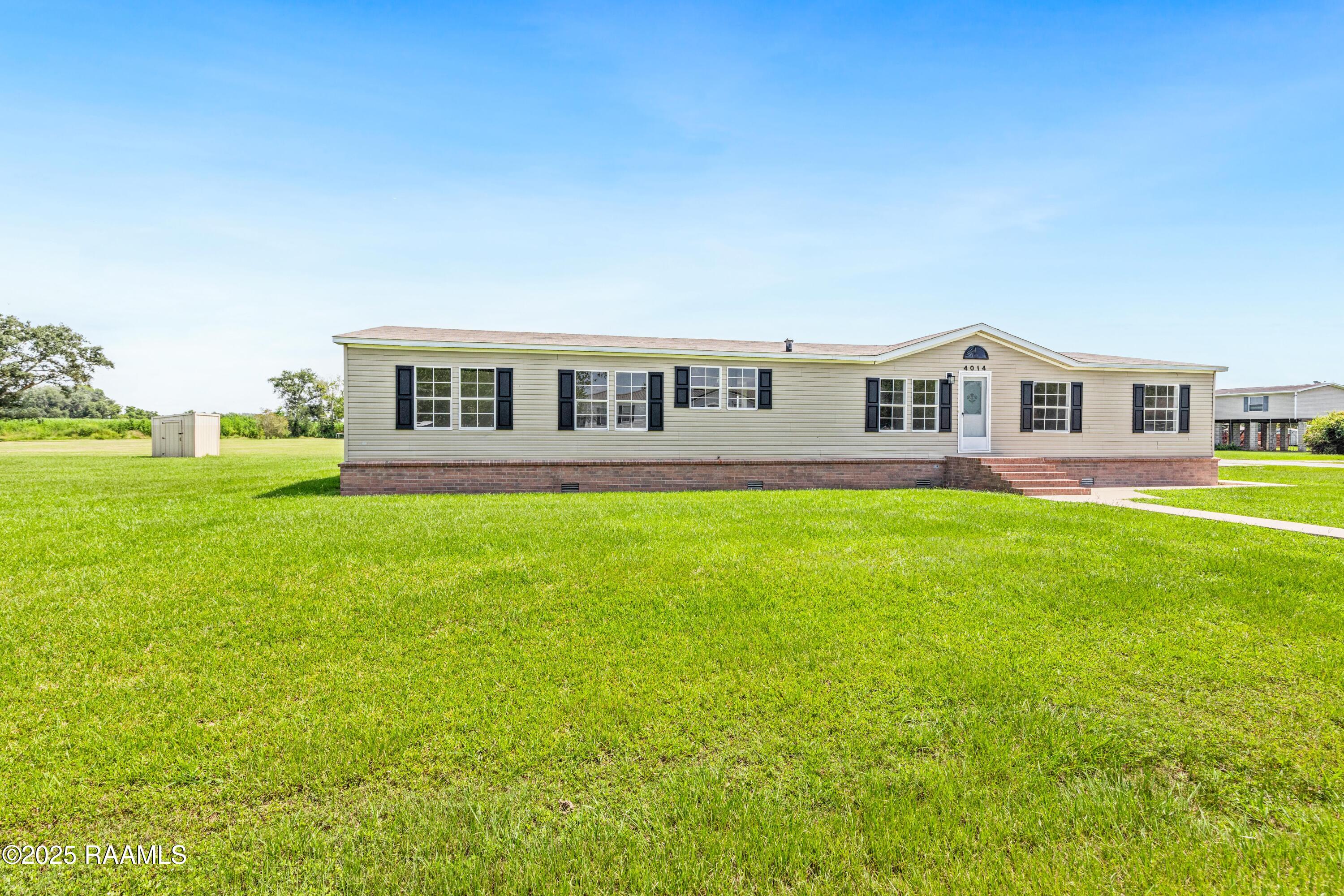 4014 Rue Martine New Iberia, LA 70560 - Photo 3 of 32 4014RueMartine-1