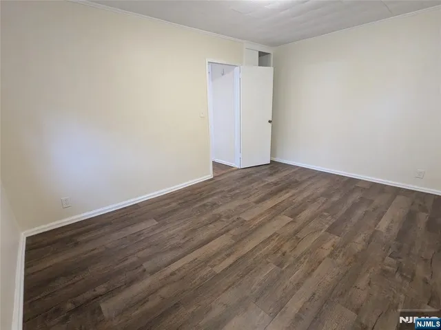 workspace with wooden floor and window