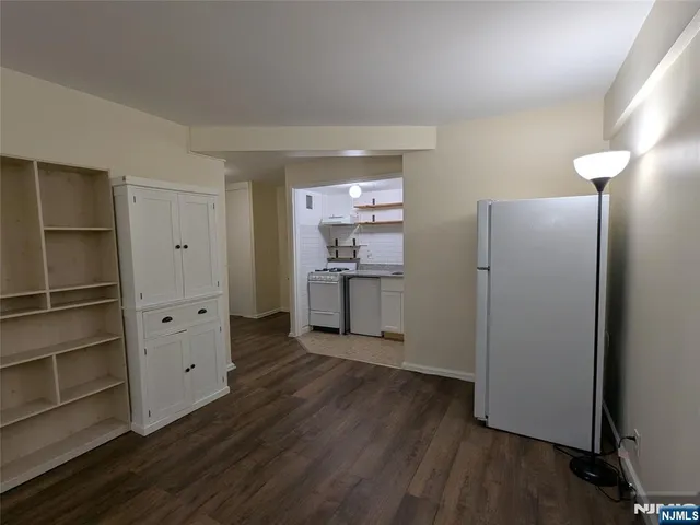 a utility room with sink dryer and washer