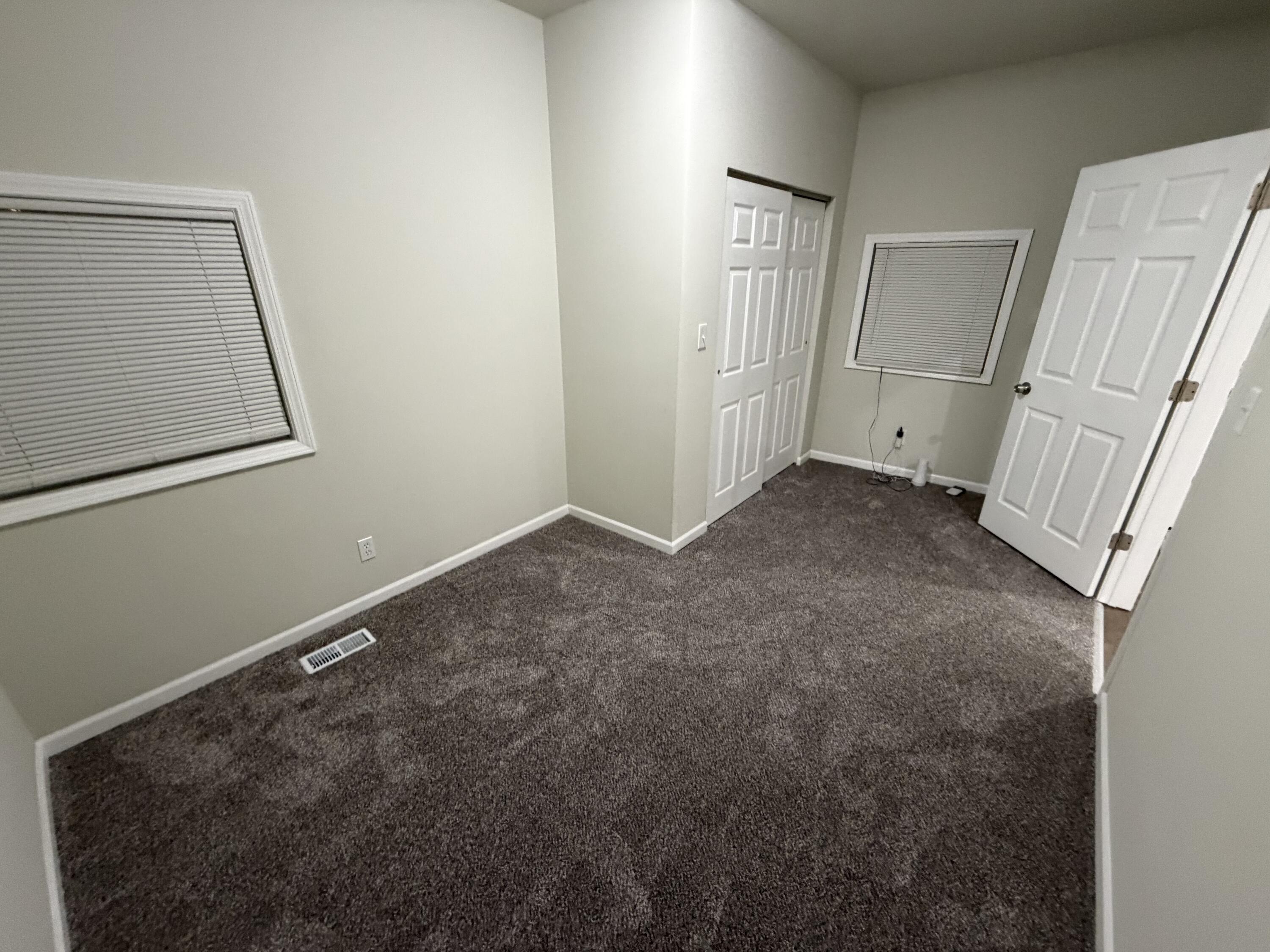 3744 Washington Street Gary, IN 46408 - Photo 11 of 25 a view of an empty room with a fireplace