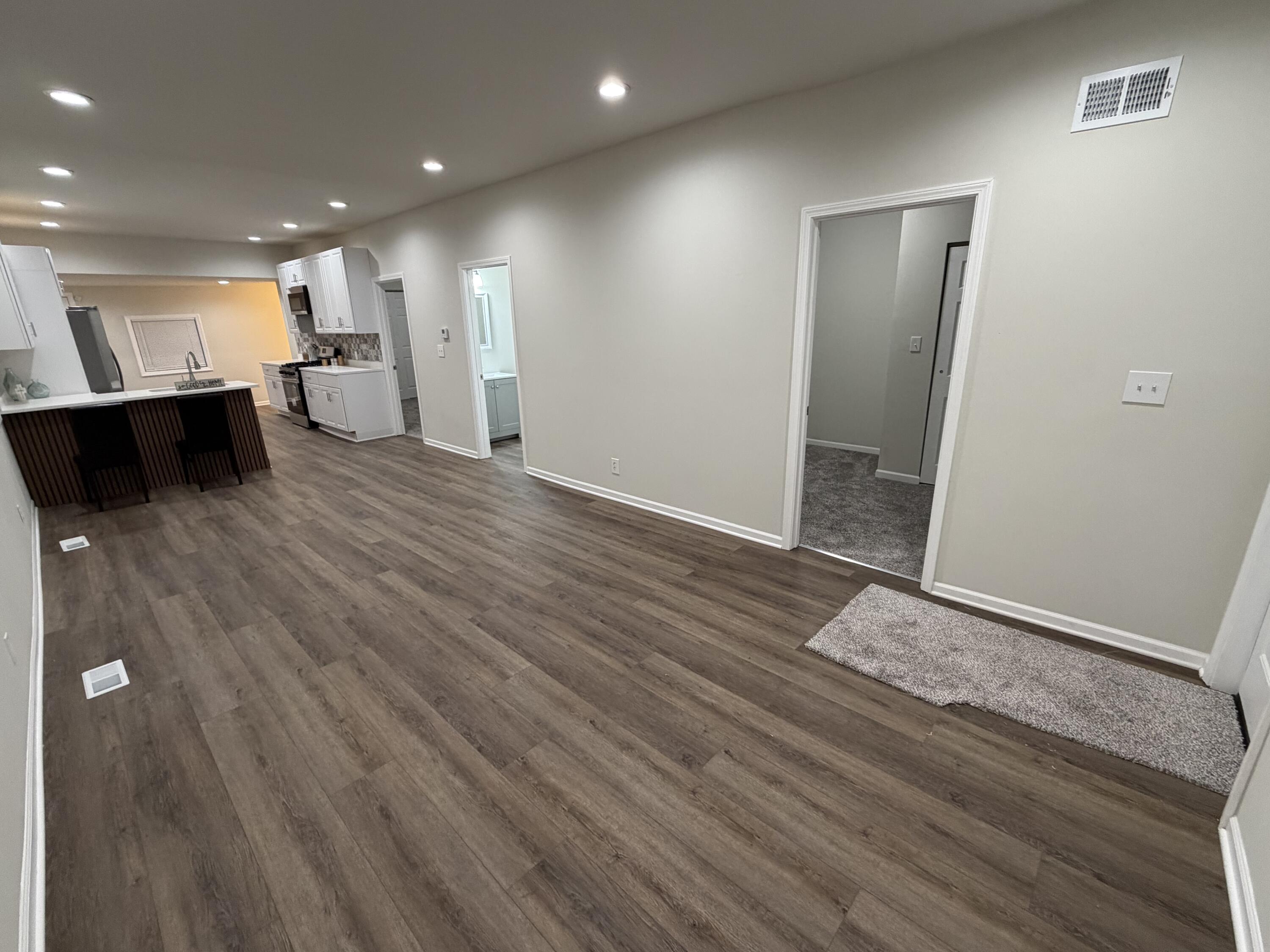 3744 Washington Street Gary, IN 46408 - Photo 7 of 25 a view of a hallway with wooden floor