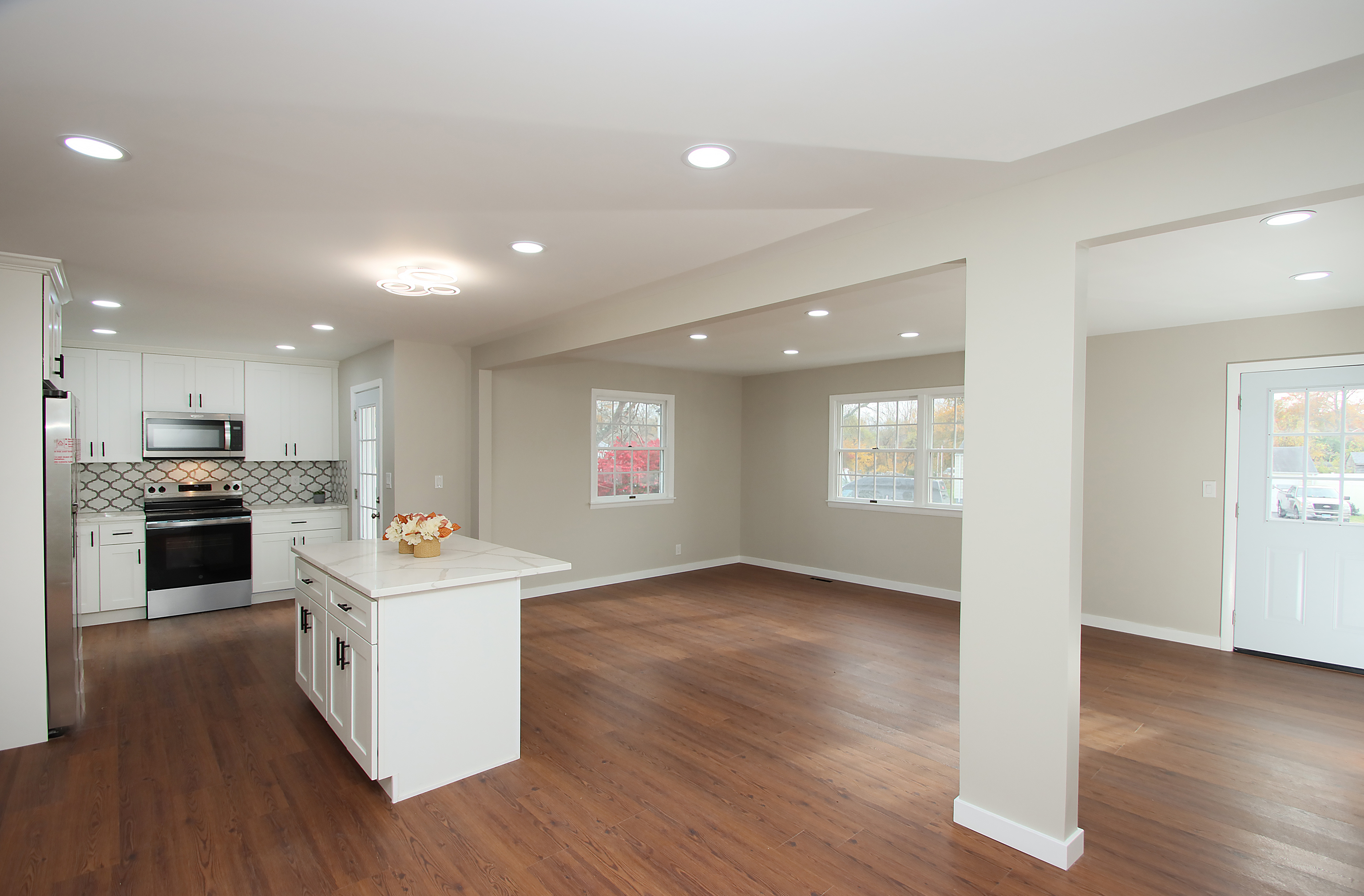 18 Riverdale Road Milford, CT 06460 - Photo 13 of 33 View from the dining room to the living room and kitchen.