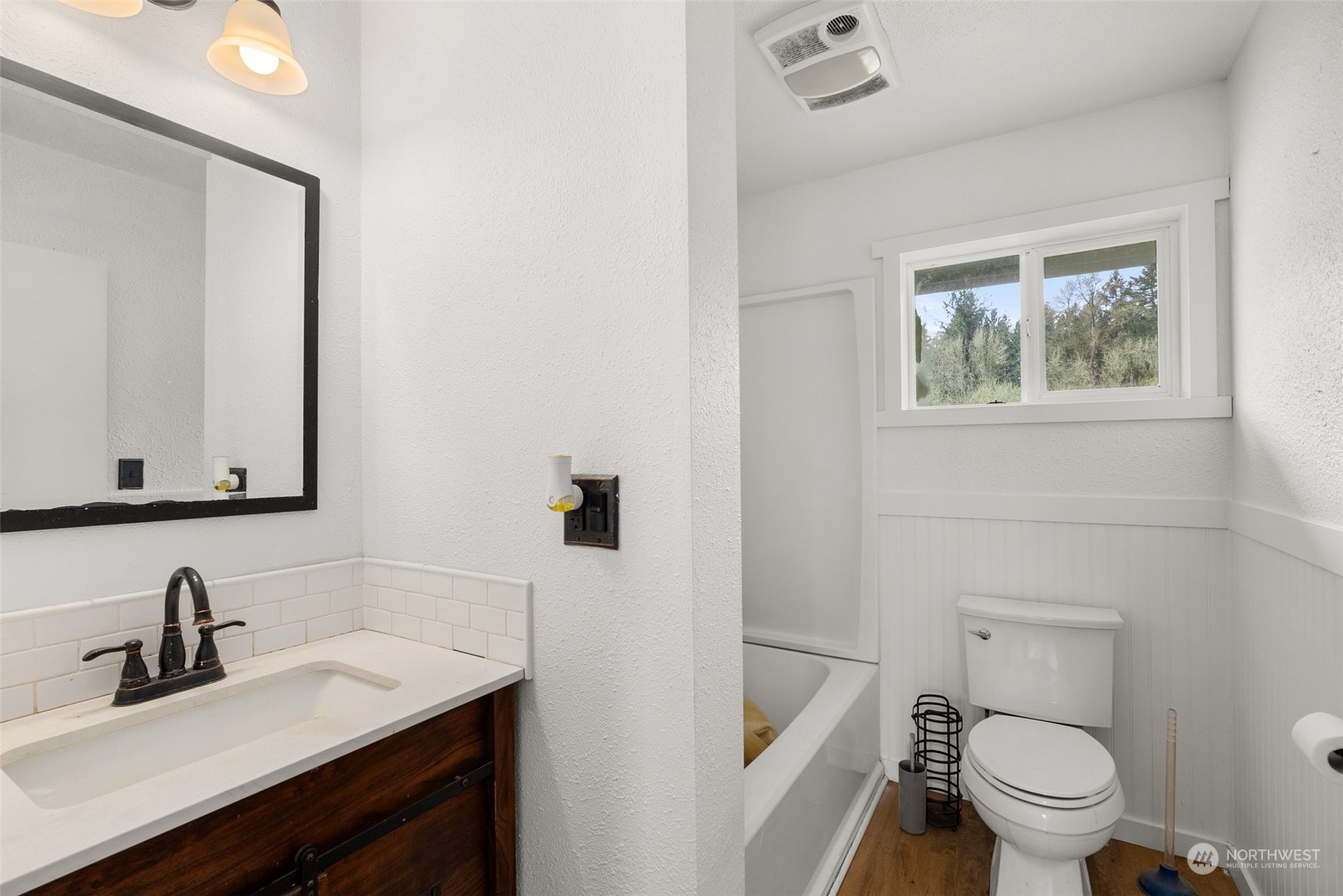 127 Remy Lane Chehalis, WA 98532 - Photo 13 of 24 a bathroom with a toilet sink and mirror