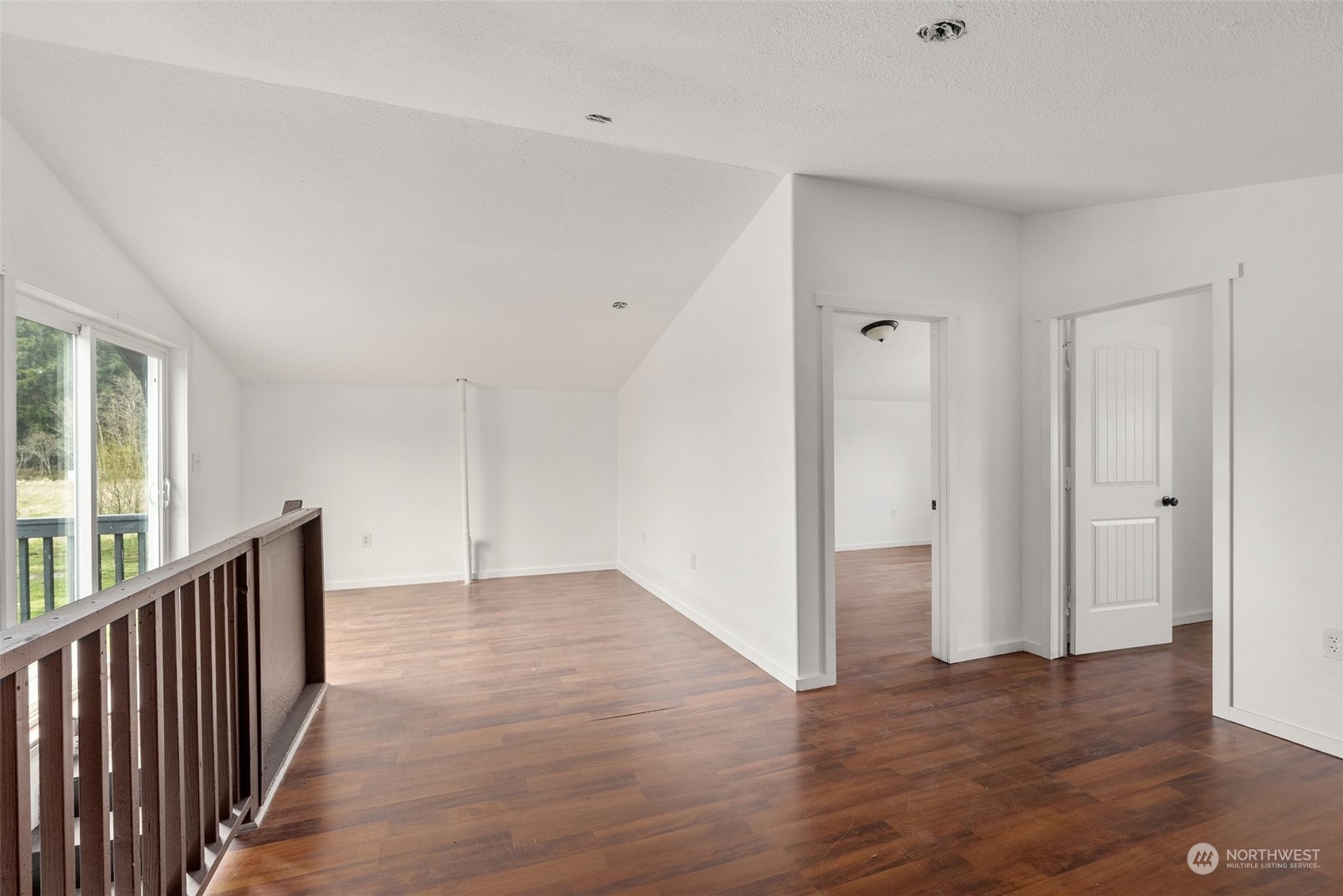 127 Remy Lane Chehalis, WA 98532 - Photo 15 of 24 a view of a hallway with wooden floor