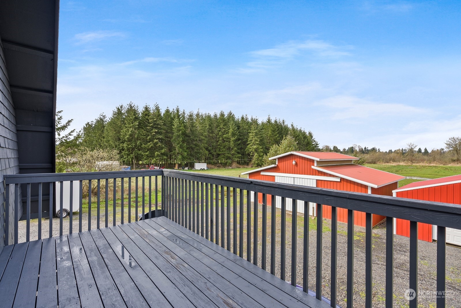 127 Remy Lane Chehalis, WA 98532 - Photo 3 of 24 a balcony with wooden floor and city view