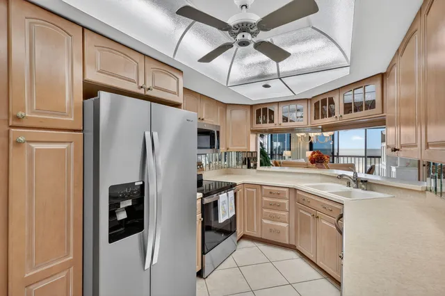 a bedroom with furniture and a flat screen tv
