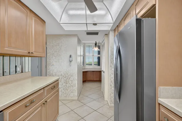 a bathroom with a sink double vanity and a mirror