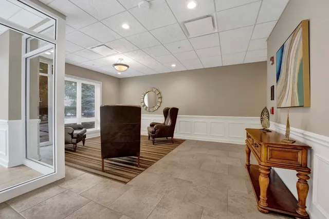 a room with furniture and wooden floor