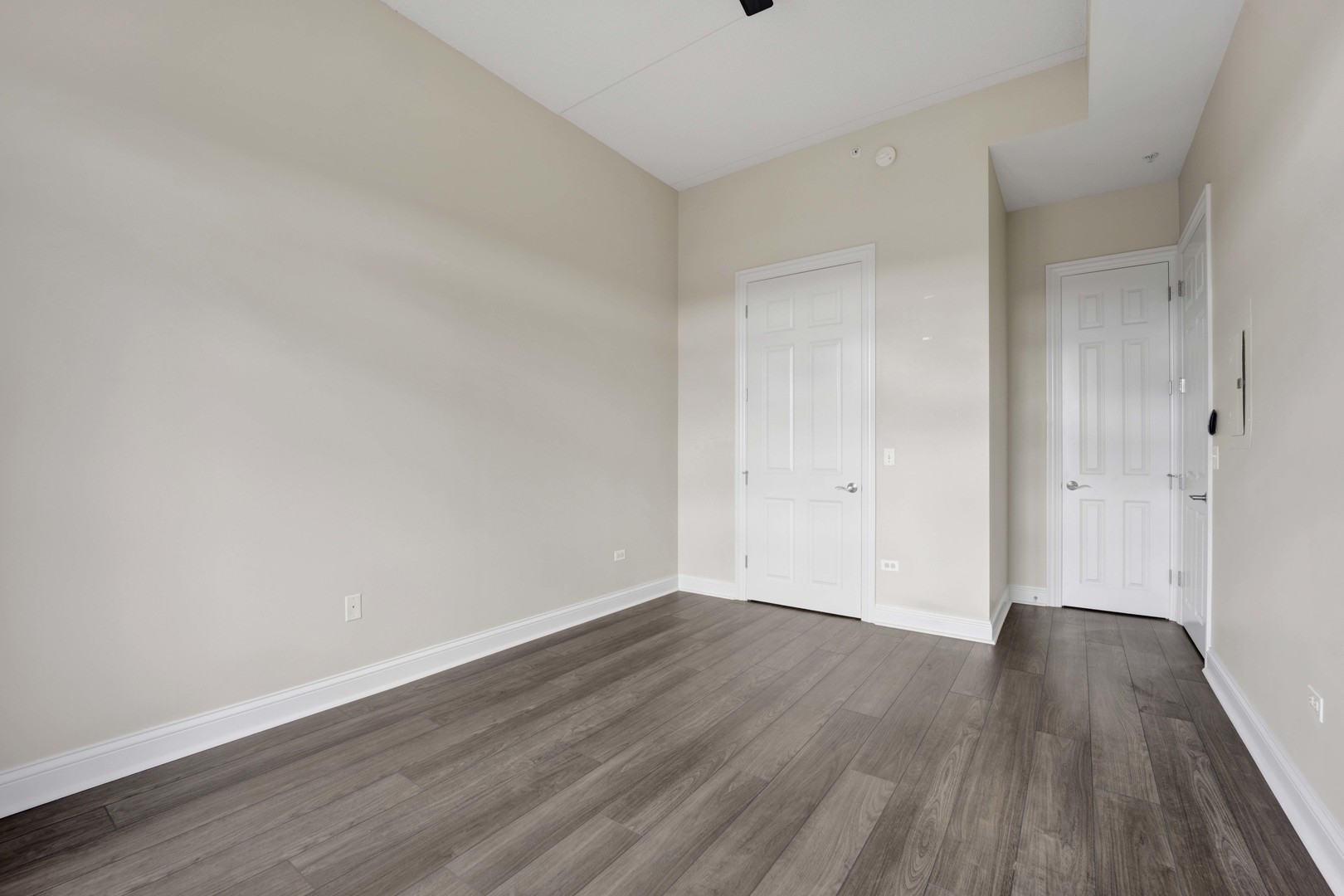 799 Graceland Avenue, Unit 504A Des Plaines, IL 60016 - Photo 23 of 25 a view of an empty room with wooden floor