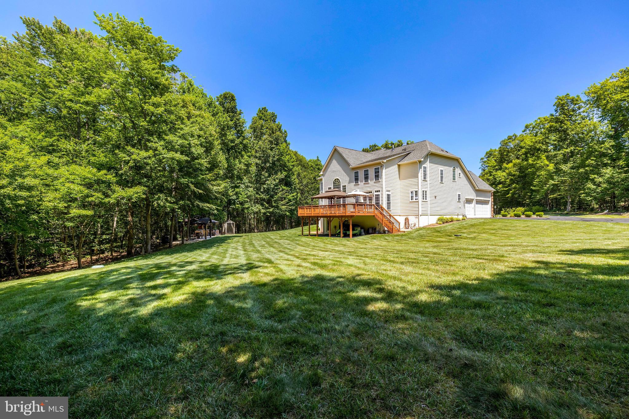 13650 Independence Ridge Nokesville, VA 20181 - Photo 61 of 98 Expansive Rear Lawn & Private Wooded Surroundings