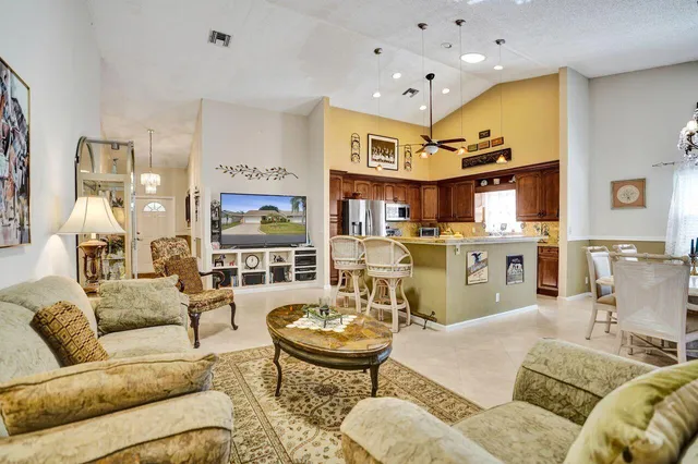 a kitchen with counter top space and stainless steel appliances