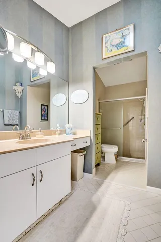 a bathroom with a toilet sink and tub