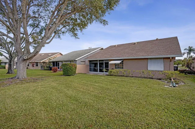 a view of a swimming pool with a garden