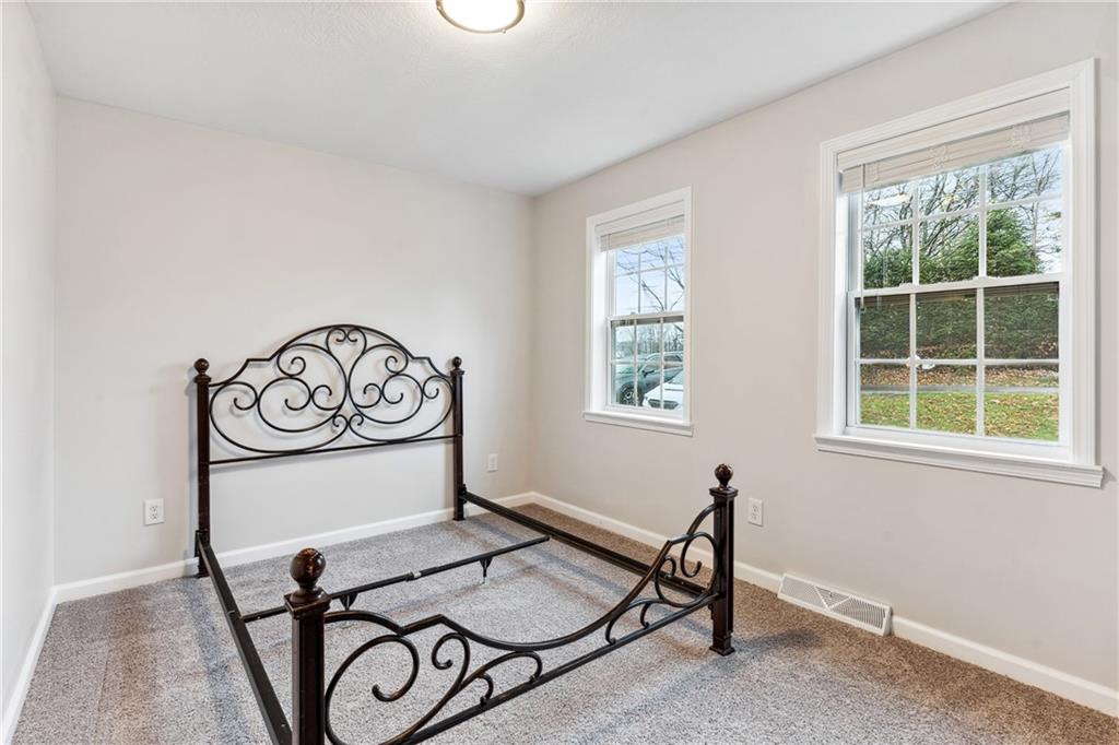 205 Rennick Road Butler, PA 16002 - Photo 11 of 40 a view of a room that has a table and a chair in it