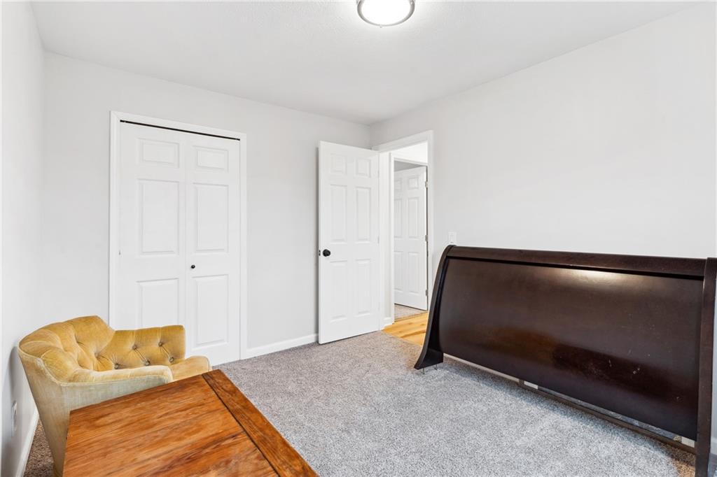 205 Rennick Road Butler, PA 16002 - Photo 14 of 40 a bedroom with a bed and a couch