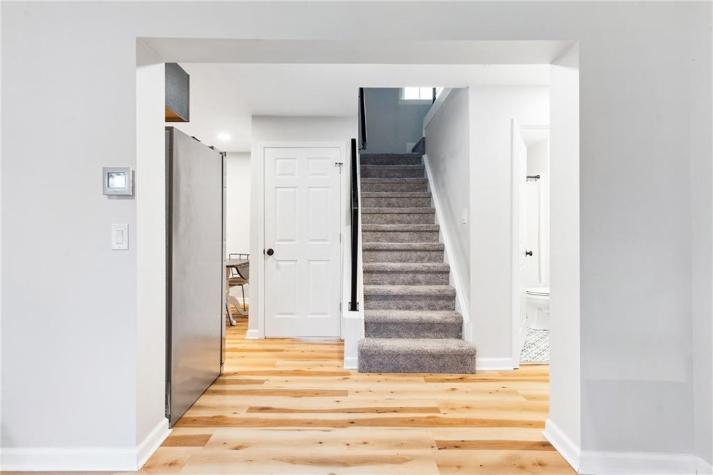 205 Rennick Road Butler, PA 16002 - Photo 23 of 40 a view of a hallway with wooden floor and entryway