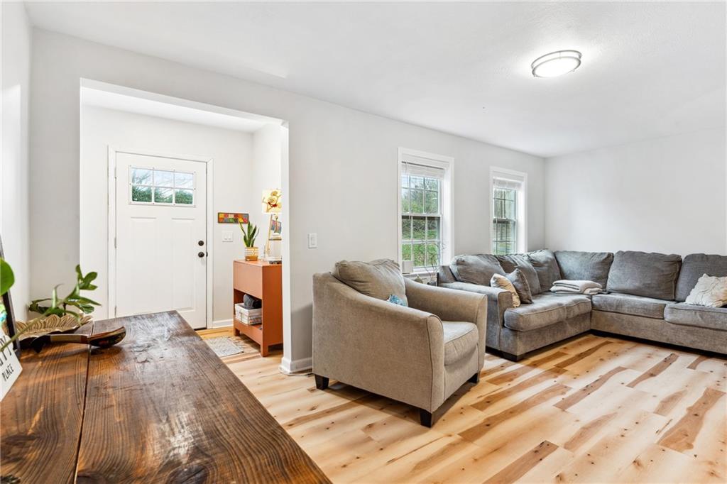205 Rennick Road Butler, PA 16002 - Photo 6 of 40 a living room with furniture and a wooden floor