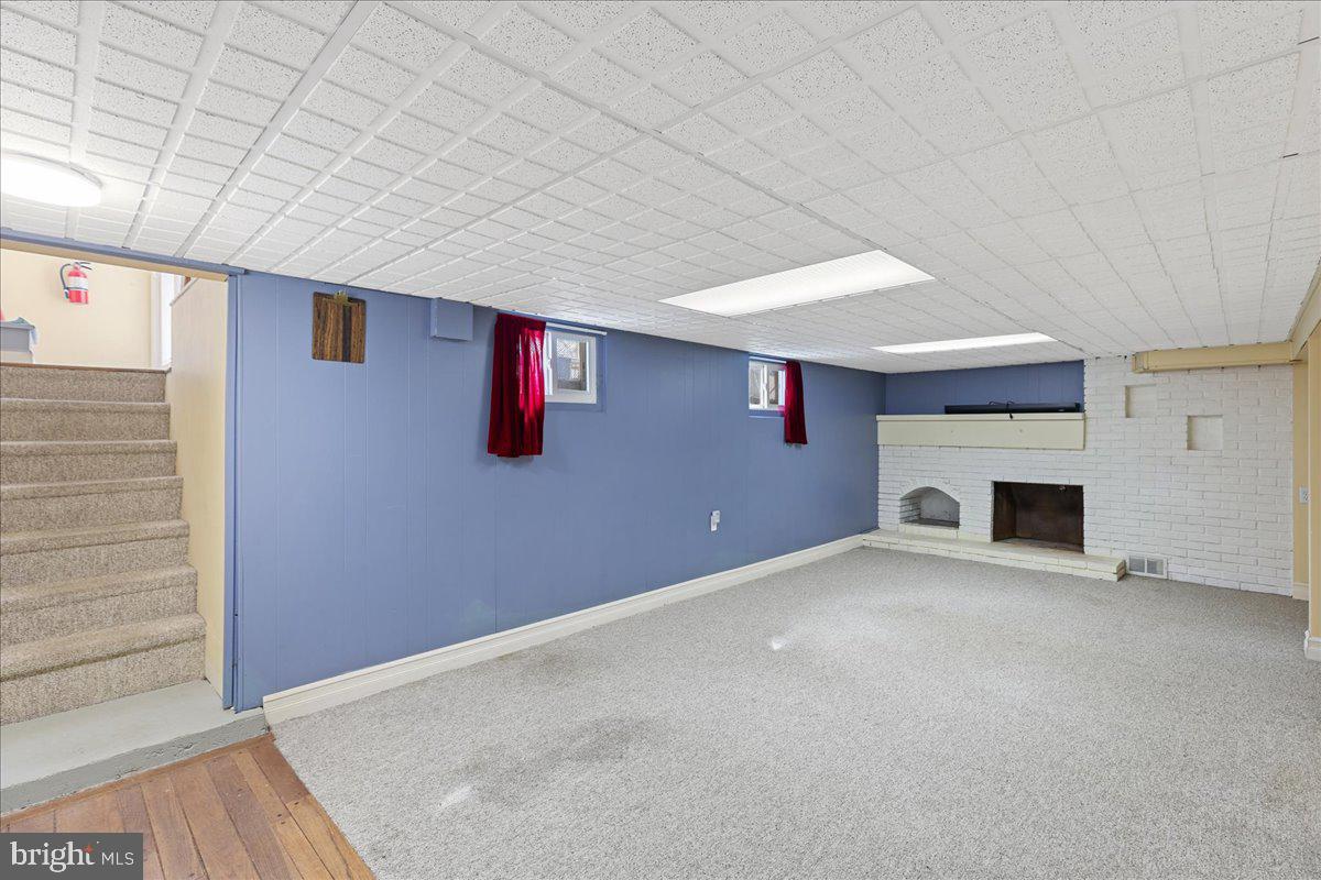 303 East Evesham Road Voorhees, NJ 08043 - Photo 12 of 34 a view of empty room with a fireplace