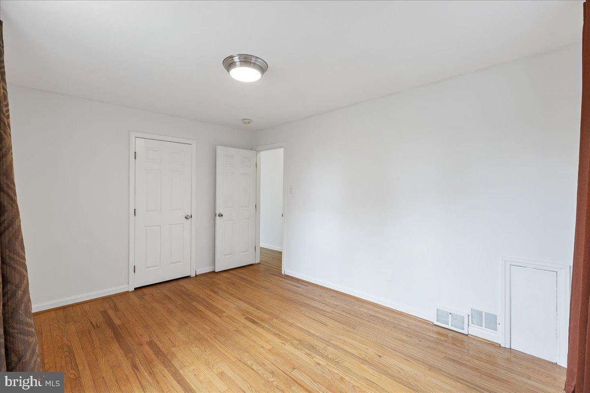 303 East Evesham Road Voorhees, NJ 08043 - Photo 18 of 34 a view of empty room with wooden floor