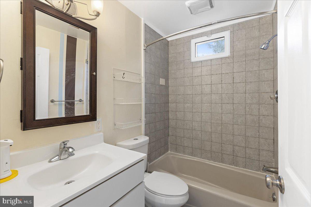 303 East Evesham Road Voorhees, NJ 08043 - Photo 23 of 34 a bathroom with a sink mirror toilet and bathtub