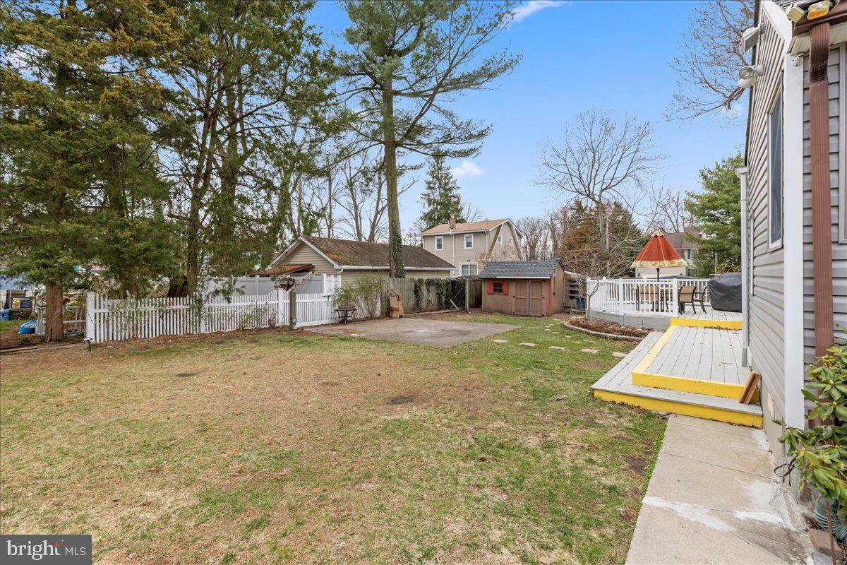 303 East Evesham Road Voorhees, NJ 08043 - Photo 31 of 34 a view of a house with a yard and sitting area