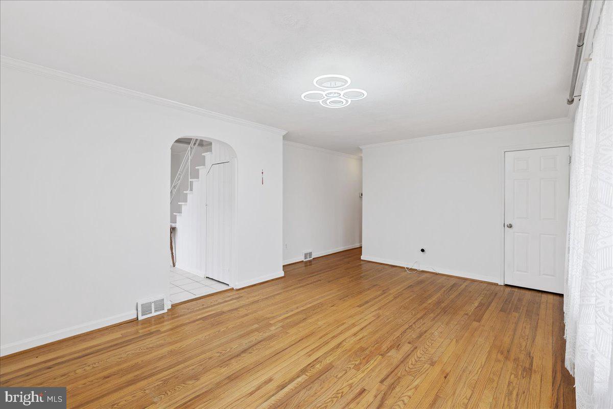 303 East Evesham Road Voorhees, NJ 08043 - Photo 7 of 34 a view of empty room with wooden floor