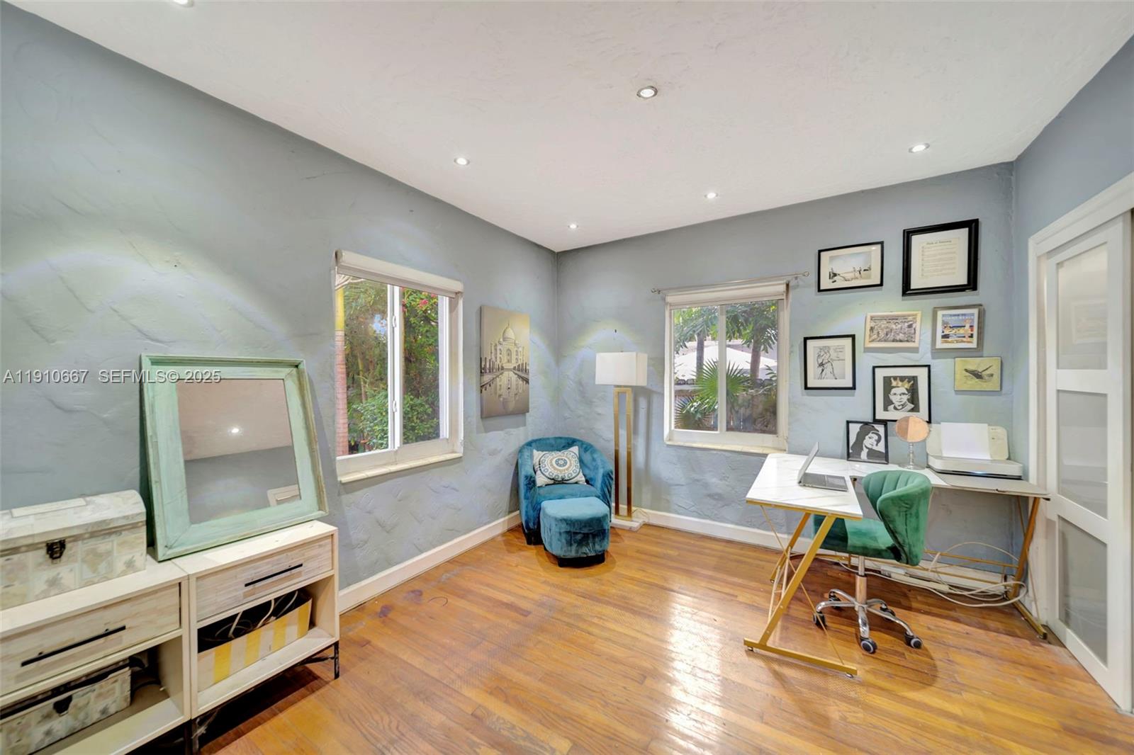 619 Northeast 87th Street Miami, FL 33138 - Photo 20 of 38 a living room with furniture and a table